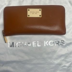 Michael Kors brown leather wallet.